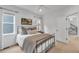 Bright bedroom featuring a large window, ceiling fan, and neutral décor at 16550 Umatilla Pl, Broomfield, CO 80023