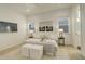 Bright bedroom featuring a comfortable bed, stylish decor, and modern furniture at 16550 Umatilla Pl, Broomfield, CO 80023