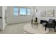 Inviting living room with comfortable seating, natural light, and modern decor at 16550 Umatilla Pl, Broomfield, CO 80023