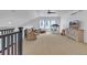 Spacious loft area with a window view and a play area at 16550 Umatilla Pl, Broomfield, CO 80023