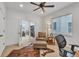 Home office featuring natural light, a ceiling fan, and comfortable seating at 16550 Umatilla Pl, Broomfield, CO 80023