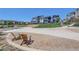 Playground seating area with two chairs and homes in background at 16550 Umatilla Pl, Broomfield, CO 80023