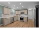 Bright kitchen featuring stainless steel appliances, light cabinetry, and granite countertops at 13096 Birch Dr, Thornton, CO 80241