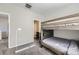 Bedroom with gray carpet and bunk beds at 623 S Pitkin Ct, Aurora, CO 80017