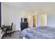 Bedroom features a dresser, desk, and closet, offering ample storage and workspace at 623 S Pitkin Ct, Aurora, CO 80017