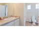 Clean bathroom with toilet, shower, and vanity at 13699 Pecos Loop, Broomfield, CO 80023