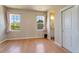 Bright bedroom with hardwood floors and en-suite bathroom at 13699 Pecos Loop, Broomfield, CO 80023