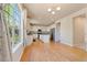 Bright dining area with hardwood floors and kitchen view at 13699 Pecos Loop, Broomfield, CO 80023