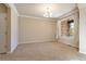 Spacious dining room with neutral color palette and large window at 13699 Pecos Loop, Broomfield, CO 80023