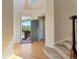 Bright entryway with hardwood floors and view to the backyard at 13699 Pecos Loop, Broomfield, CO 80023