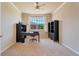 Bright home office features built-in shelving and window views at 13699 Pecos Loop, Broomfield, CO 80023
