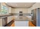 Kitchen with granite countertops and stainless steel appliances at 13699 Pecos Loop, Broomfield, CO 80023