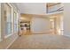 Open living room with view of kitchen and staircase at 13699 Pecos Loop, Broomfield, CO 80023