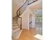 Elegant curved staircase with wrought iron railing at 13699 Pecos Loop, Broomfield, CO 80023