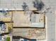 Aerial view of the property showcasing its fenced yard, landscaping, and surrounding neighborhood at 801 S Leyden St, Denver, CO 80224