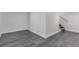 Spacious unfinished basement with gray floors and a stairway leading to the upper level at 801 S Leyden St, Denver, CO 80224