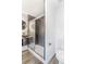 Modern bathroom featuring hexagon tile in the shower and vessel sink on modern vanity at 801 S Leyden St, Denver, CO 80224