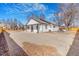 This home has a large unlandscaped yard and is surrounded by mature trees offering shade and privacy at 801 S Leyden St, Denver, CO 80224