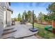 Stamped concrete patio with seating area and playset at 3087 Black Canyon Way, Castle Rock, CO 80109