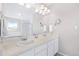 Double vanity bathroom with large mirror at 3087 Black Canyon Way, Castle Rock, CO 80109