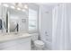 Clean bathroom with white vanity, toilet and bathtub at 3087 Black Canyon Way, Castle Rock, CO 80109