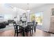 Bright dining area with table and chairs, hardwood floors, and access to the patio at 3087 Black Canyon Way, Castle Rock, CO 80109