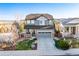 Two-story home with attached garage and landscaped yard at 3087 Black Canyon Way, Castle Rock, CO 80109