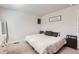 Comfortable bedroom with neutral colors, soft carpeting, and ample natural light at 1353 Reynolds St # 2B, Fort Lupton, CO 80621