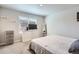 Cozy bedroom with neutral tones, carpet, and window with natural light at 1353 Reynolds St # 2B, Fort Lupton, CO 80621