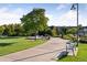 Scenic park pathway with a water fountain and inviting benches to relax at 9424 Ridgeline Blvd # I, Highlands Ranch, CO 80129