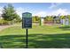 Civic Green Park sign, surrounded by lush greenery and a colorful playground at 9424 Ridgeline Blvd # I, Highlands Ranch, CO 80129
