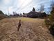 Large backyard showing the length of the house, its windows and roofline at 1501 E Caley Ave, Centennial, CO 80121