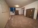 Basement featuring neutral carpet, presenting an opportunity for customization and various uses at 1501 E Caley Ave, Centennial, CO 80121