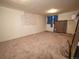 Basement featuring neutral carpet, creating a blank canvas for personalization and various uses at 1501 E Caley Ave, Centennial, CO 80121