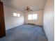 Bedroom with ceiling fan and two windows at 1501 E Caley Ave, Centennial, CO 80121