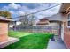 Spacious backyard offering a private, fenced space for outdoor activities at 2028 Perry St, Denver, CO 80212