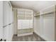 Large walk-in closet with ample shelving and hanging space at 6397 Deframe Way, Arvada, CO 80004