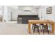 Finished basement with dining table, bar, wine fridge, and seating area at 200 Magnolia St, Denver, CO 80220