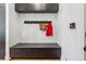 Stylish entryway with built-in bench, coat hooks, and a smart home control panel at 200 Magnolia St, Denver, CO 80220