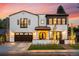 Stunning two-story home showcasing a blend of modern design and classic charm with professional landscaping at 200 Magnolia St, Denver, CO 80220
