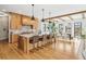 Modern kitchen with a large island, quartz countertops, and bar stool seating at 200 Magnolia St, Denver, CO 80220