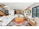 Cozy living room with an open floor plan and hardwood flooring at 200 Magnolia St, Denver, CO 80220
