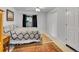 Inviting bedroom with soft carpet, natural light, and ample storage space at 8838 S Dudley St, Littleton, CO 80128
