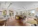 Large bonus room with bright windows and backyard views, suitable for many functions at 12653 Rancho Ct, Conifer, CO 80433
