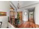 Foyer with tile floors, a plant, and a staircase with wooden floors that complements the interior design at 12653 Rancho Ct, Conifer, CO 80433