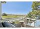 Balcony seating area with a view of the lush green surrounding scenery at 9977 Falcon Creek Dr, Highlands Ranch, CO 80130