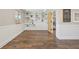 Finished basement featuring wood floors, recessed lighting, and shelving units at 9977 Falcon Creek Dr, Highlands Ranch, CO 80130