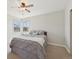 Neutral bedroom with natural light and a large bed at 9977 Falcon Creek Dr, Highlands Ranch, CO 80130