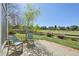 Seating area on an outdoor patio with a great view of the surrounding neighborhood at 9977 Falcon Creek Dr, Highlands Ranch, CO 80130