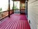View of the deck with wooden lattice and railing offers an outdoor retreat at 29983 Hilltop Dr # 2, Evergreen, CO 80439